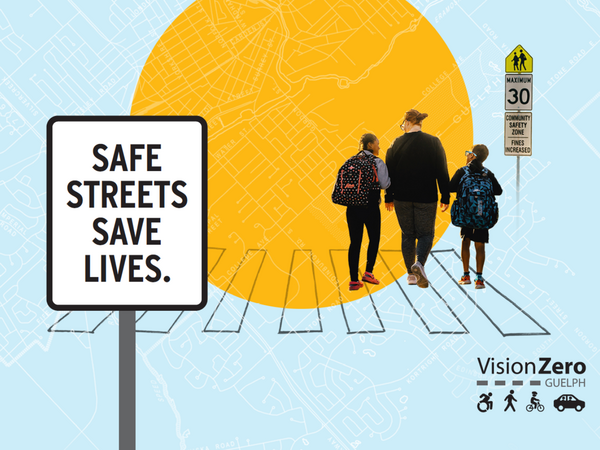 A parent with two children stand on a graphic of a crosswalk with a community safety zone sign, and a sign that says 'Safe streets save lives'.